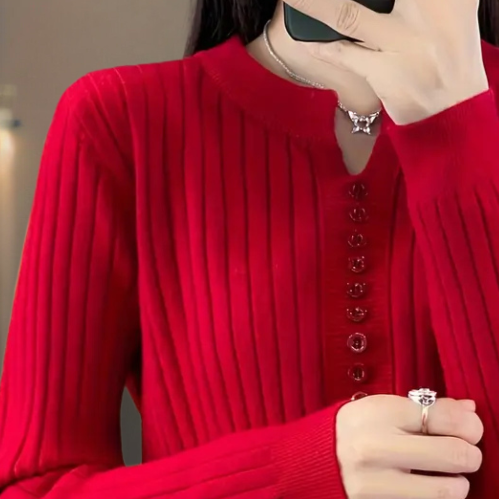 Versatile women's v-neck jumper, featuring chic button accents and long sleeves for winter.