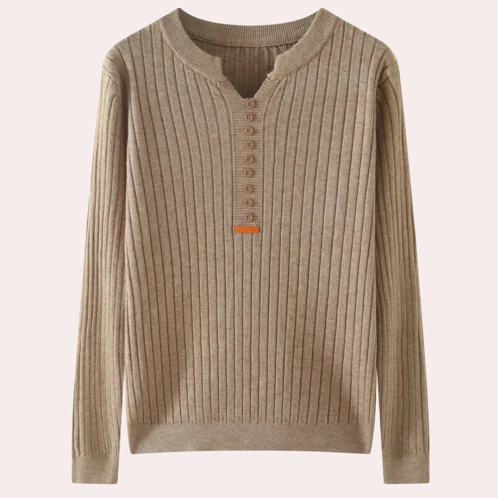 Winter wardrobe essential: women's v-neck sweater with decorative button details.