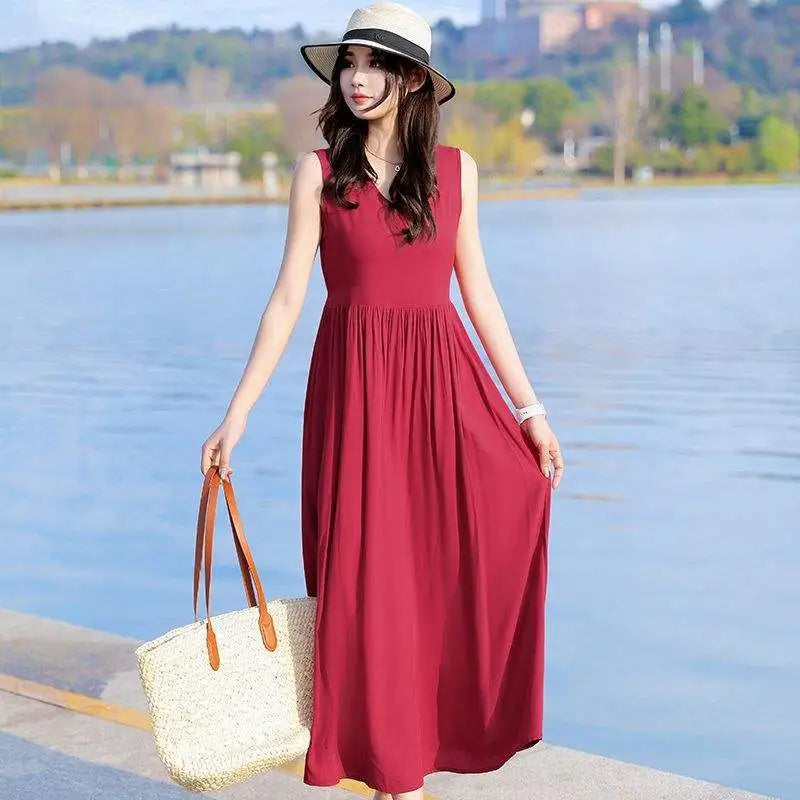 Elegant women's V-neck tie waist maxi dress with pockets, perfect for summer & vacation comfort.
