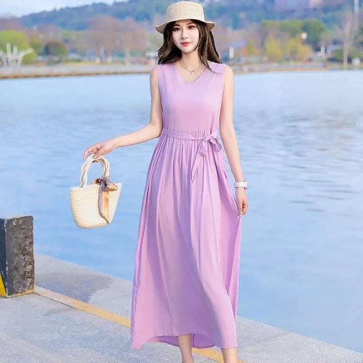 Full-length women's V-neck maxi dress with tie waist & pockets, a comfortable choice for any occasion.