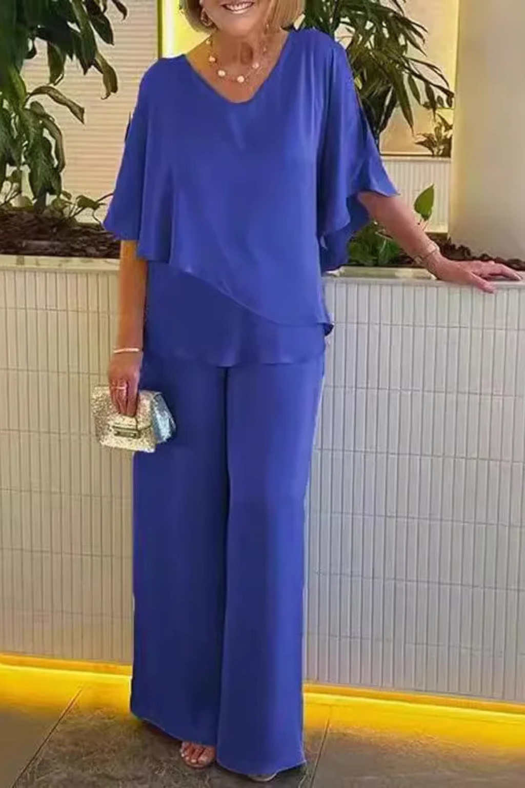 Flowy wide leg pants & batwing top in a women's elegant V-neck two-piece set. Stylish co-ord.