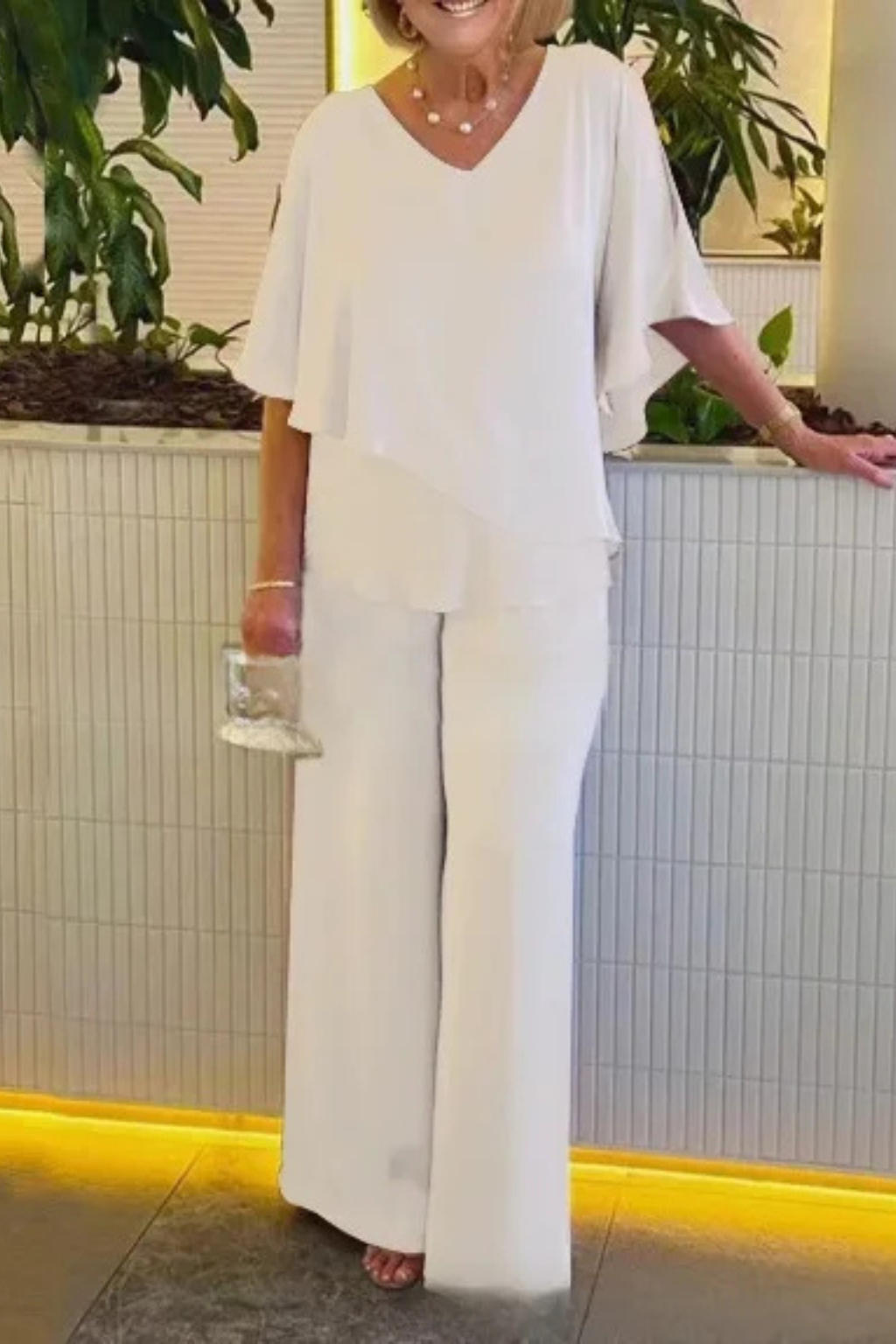 Versatile khaki two-piece set for women, featuring a V-neck batwing top & wide leg trousers.