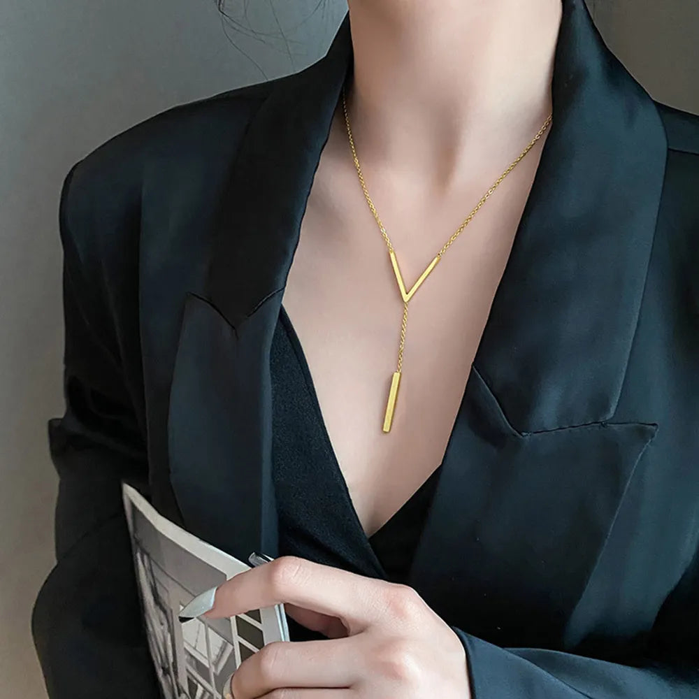 Stylish women's V-shape gold tone necklace. Elegant stainless steel jewelry, an ideal gift for her.