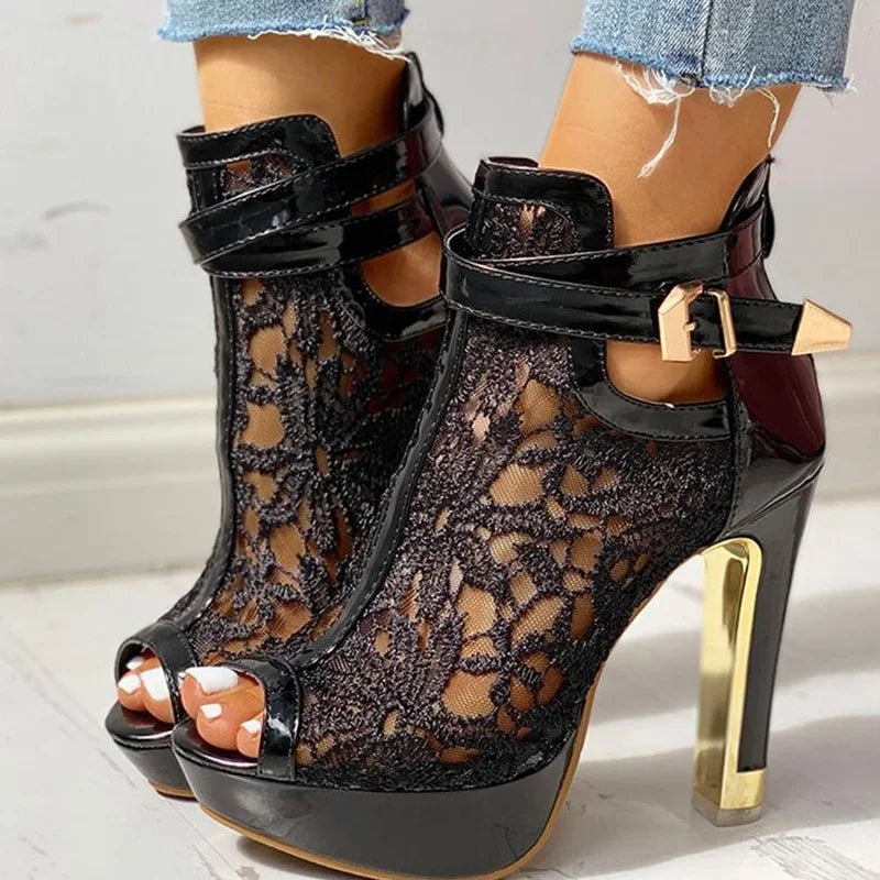 Side profile of a Black Women's Valencia platform heel, showcasing its elegant silhouette and high arch.