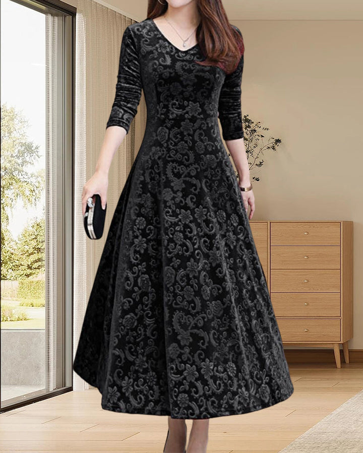 Comfortable long sleeve velvet midi dress for women featuring a flattering V-neck, ideal for elegant style.