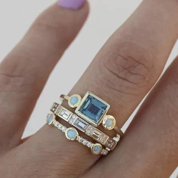 Elegant women's vintage blue crystal ring, gold plated, with classic design. Timeless statement jewelry gift.