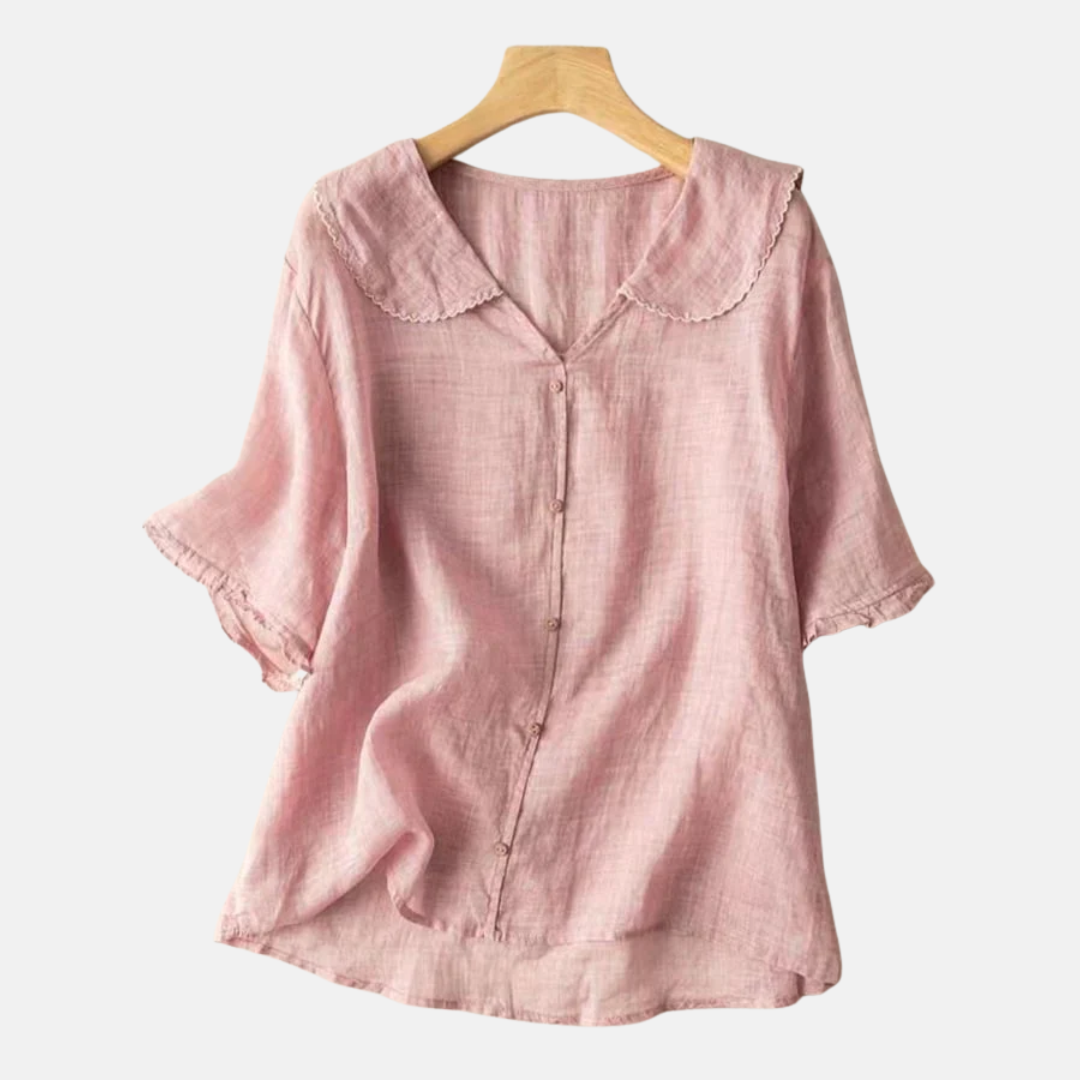 Stylish women's vintage doll collar short sleeve blouse. Elegant and chic top for versatile casual fashion.