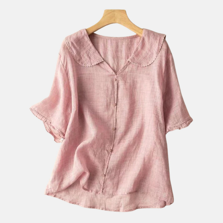 Stylish women's vintage doll collar short sleeve blouse. Elegant and chic top for versatile casual fashion.