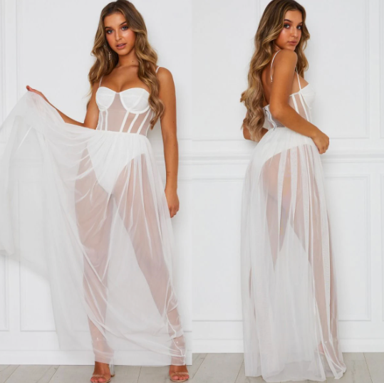 Seductive vintage style women's dress. A charming sleeveless festival piece for elegant summer and party occasions.