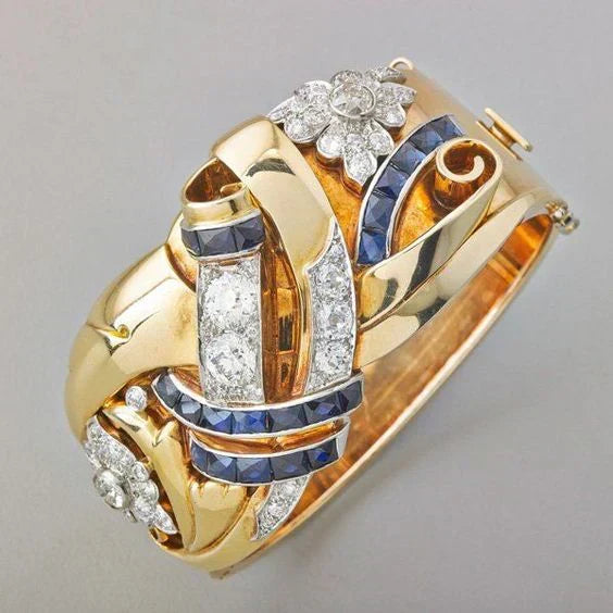 Elegant women's vintage gold ring with a sparkling blue zirconia, perfect as a classic jewelry gift or statement piece.