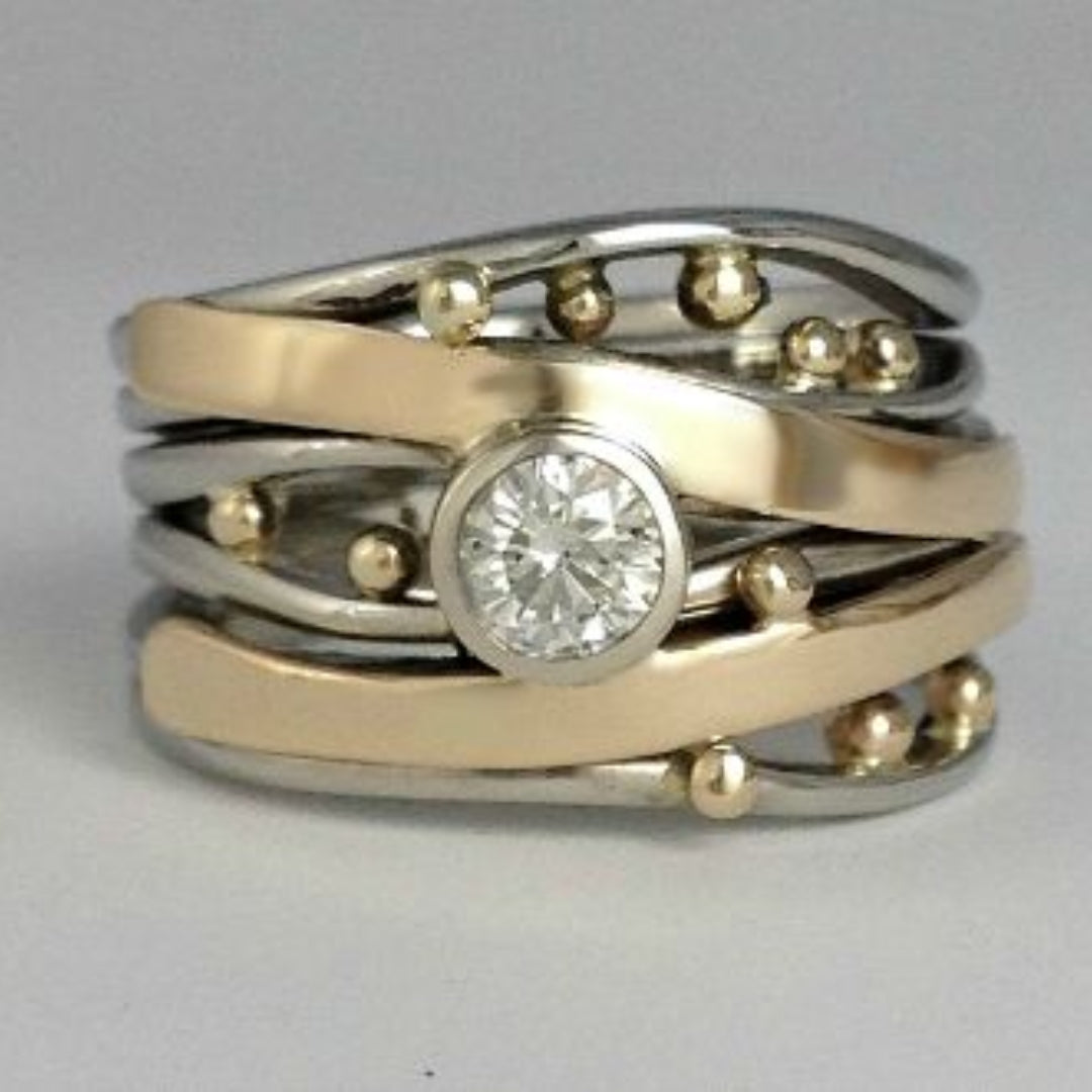 Elegant women's vintage gold ring with inlaid zirconia stones, a timeless fashion accessory and beautiful gift.