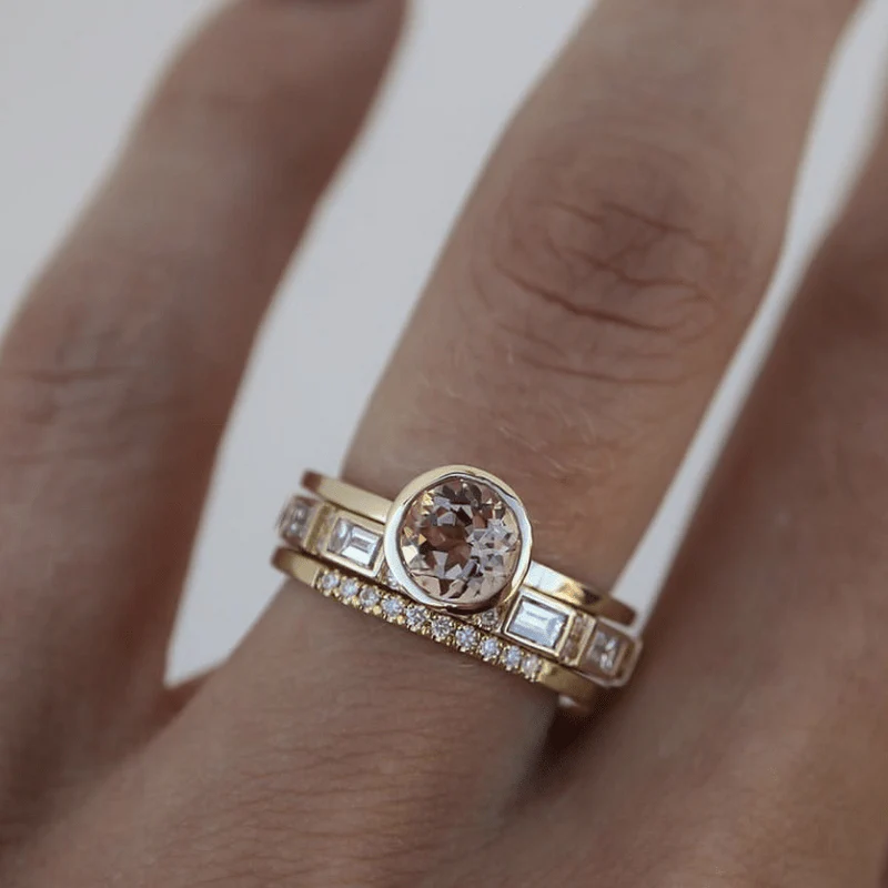 Elegant women's vintage golden ring with sparkling crystals, a timeless fashion statement.