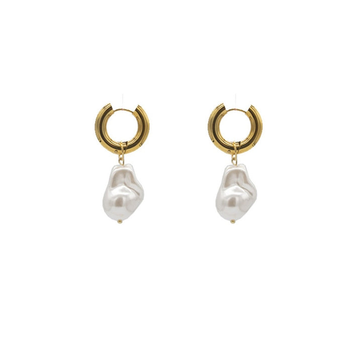 Beautiful women's vintage pearl drop earrings, perfect elegant retro chic jewelry for a stylish statement.