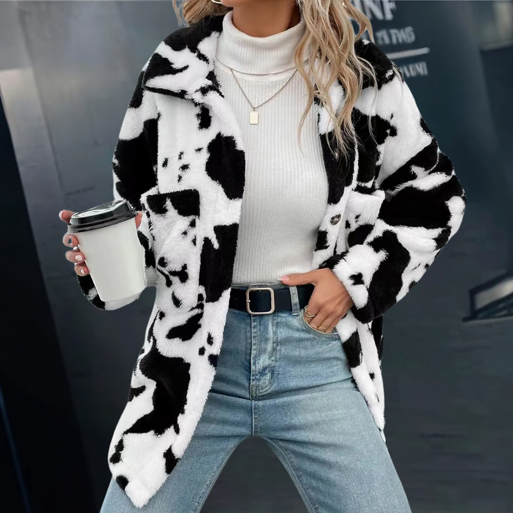 Elegant women's warm winter coat, ideal for cold weather. Cozy long jacket, stylish everyday outerwear.