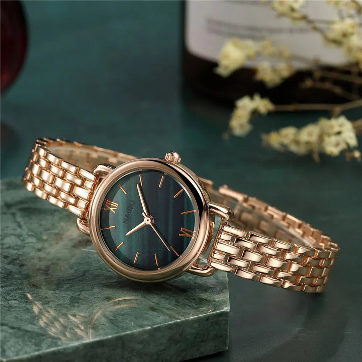 Elegant women's watch, marble dial, polished stainless steel band. Perfect fashion accessory.
