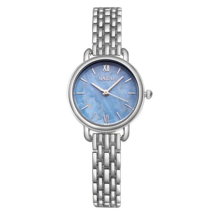 Sophisticated women's timepiece, unique marble dial, and durable stainless steel band. Modern fashion accessory.