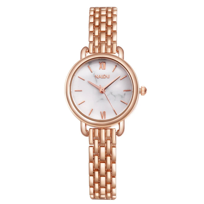 Women's elegant watch, classic marble dial, silver-tone stainless steel band. A versatile fashion accessory.
