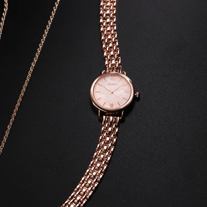 Close-up: Women's fashion watch, exquisite marble dial & shiny stainless steel band. Perfect accessory.