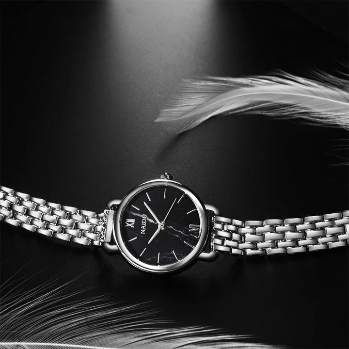 Women's elegant watch with a striking marble dial & durable stainless steel band. A modern timepiece.