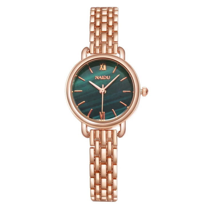 Women's rose gold-tone watch, elegant marble dial & sleek stainless steel band. A chic fashion accessory.
