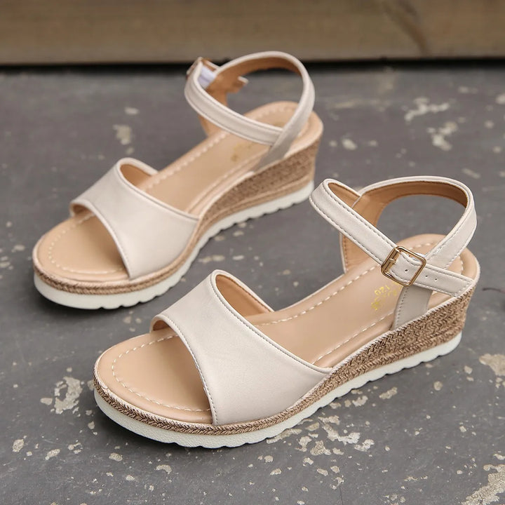 Women's comfortable wedge heels, perfect elegant footwear for summer. High heel provides all-day support & style.
