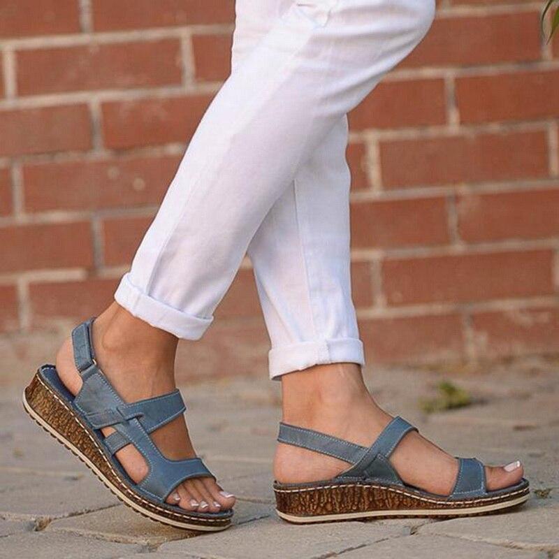 Comfortable women's wedge sandals with arch support, ideal for walking and long summer days.