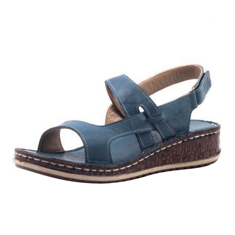 Supportive women's wedge heel sandals, combining comfort with elegant style for summer outings.