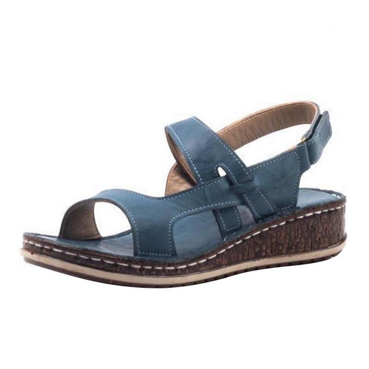 Supportive women's wedge heel sandals, combining comfort with elegant style for summer outings.