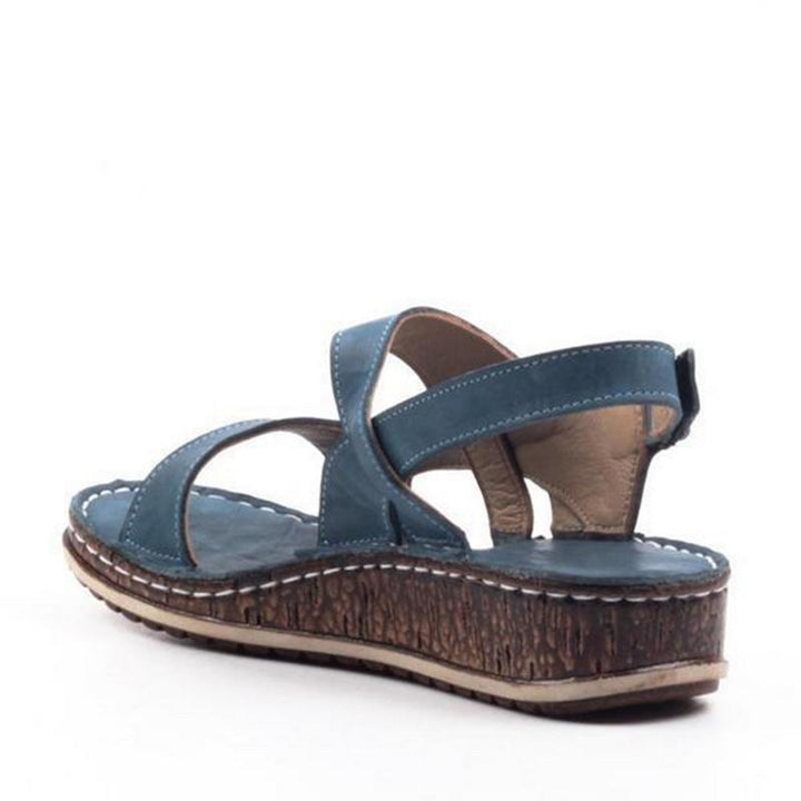 Stylish women's wedge sandals, comfortable everyday footwear for elegant summer fashion.