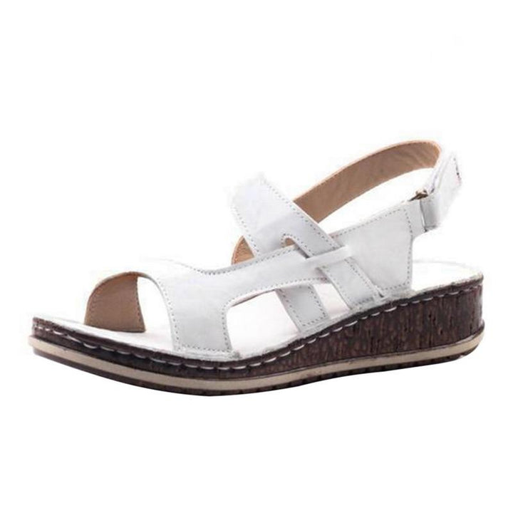 Modern design women's wedge sandals, offering comfortable heels and chic summer style.