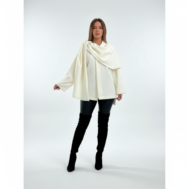 Chic white boucle poncho for women, featuring a sophisticated scarf detail and cozy wrap design