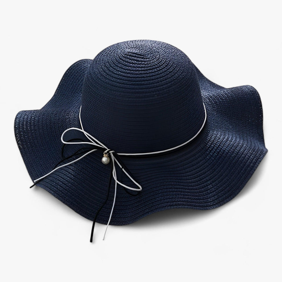 Lightweight BreezeBow sun hat for women, featuring a wide brim and stylish bow, ideal for summer accessory