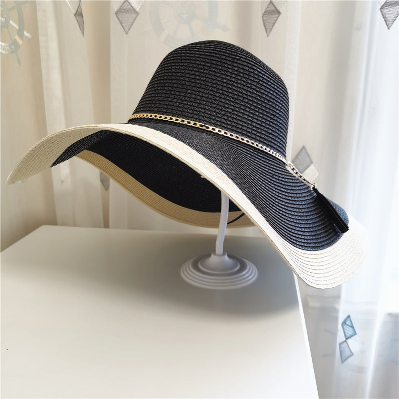 Stylish women's wide brim sunhat 'Lily', offering excellent UV protection for summer outdoor activities.