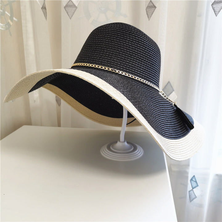 Stylish women's wide brim sunhat 'Lily', offering excellent UV protection for summer outdoor activities.
