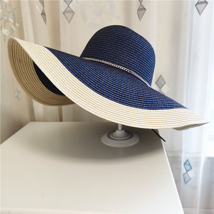 Close-up of 'Lily' women's wide brim summer hat, showcasing its weave and UV protective design.