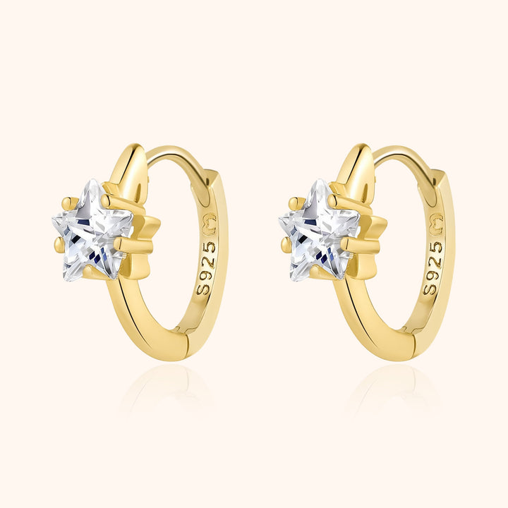 Elegant women's wide hoop earrings in silver, featuring sparkling star zirconia, perfect for any occasion.