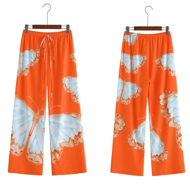 Stylish women's Liana wide leg chiffon trousers, offering a comfortable and breathable option for warm weather.