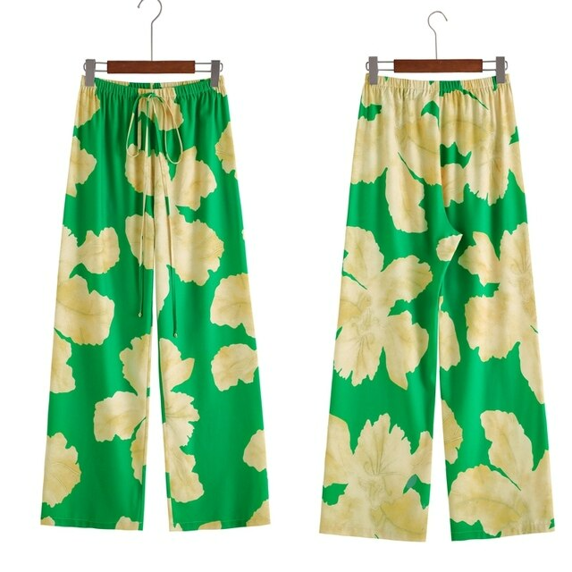 Chic Liana wide leg chiffon trousers for women, an essential piece of summer beachwear for a relaxed, elegant look.