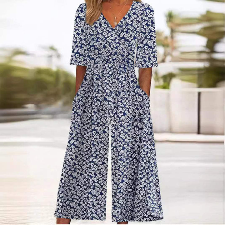 Stylish women's wide leg jumpsuit in a relaxed fit. Offers elegant comfort for spring and summer casual wear.