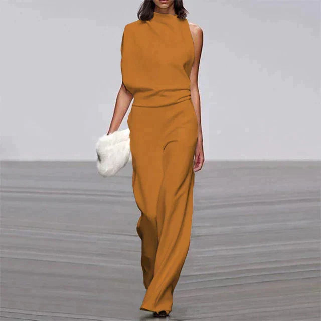 Sleeveless wide-leg jumpsuit in a solid color, an elegant & comfortable women's fashion piece for any occasion.