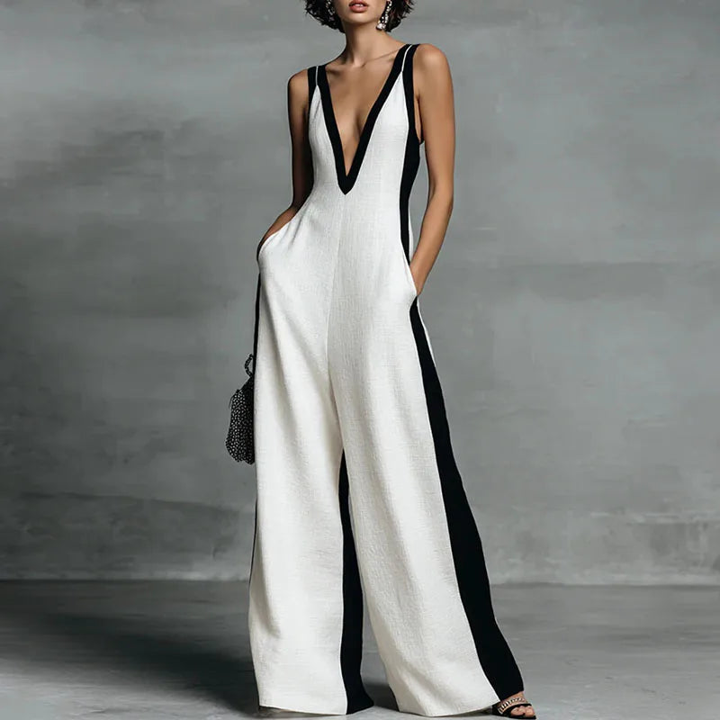Elegant women's wide-leg jumpsuit with deep V-neck, striped pattern. Perfect chic summer fashion.