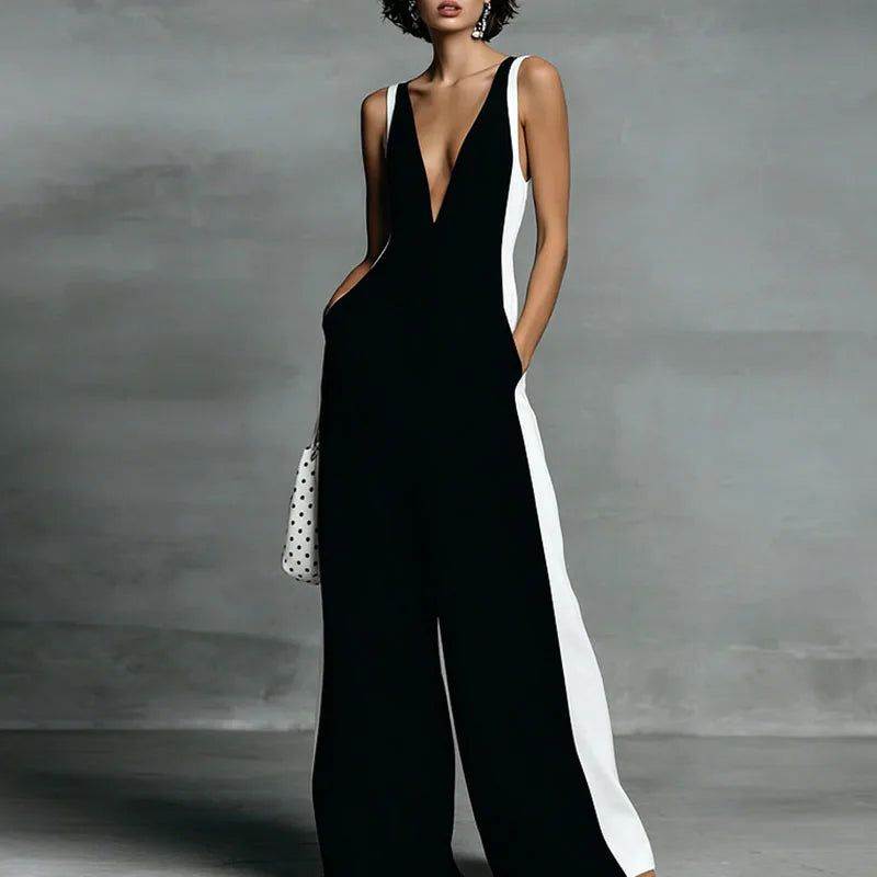 Versatile women's elegant wide-leg jumpsuit with deep V-neck, striped. Chic sleeveless for summer & vacation.