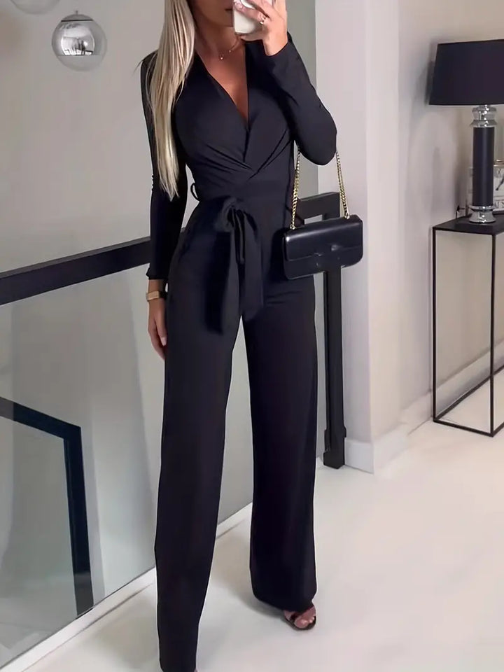 Comfortable women's wide-leg V-neck jumpsuit featuring a flattering belt, an elegant all-season piece.