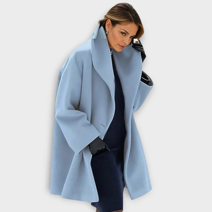 Elegant women's windproof wool winter coat for luxurious cold weather outerwear; classic long ladies fashion.