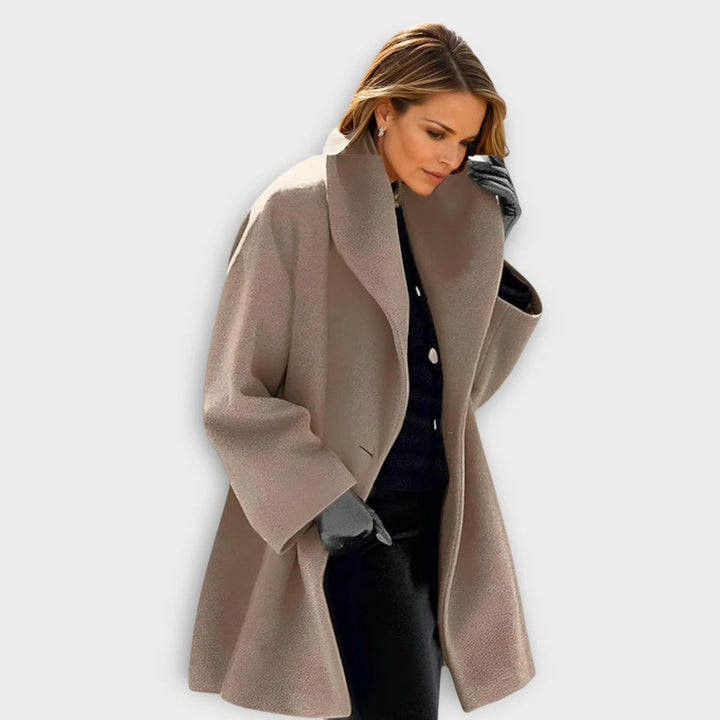 Stylish women's windproof wool winter coat, offering elegant warmth and luxurious cold weather protection.