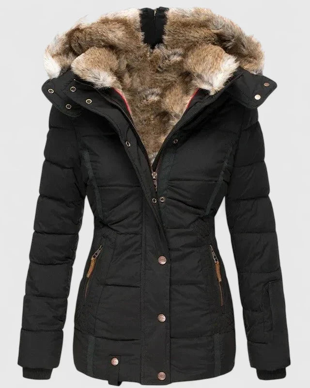 Cozy women's winter coat, ideal warm outerwear for cold days. Stylish jacket for comfort.