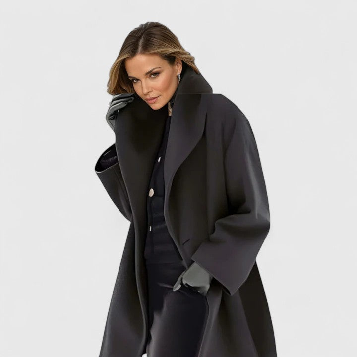 Comfortable women's elegant winter coat. Timeless style, warm outerwear with a minimalist design for ladies fashion.