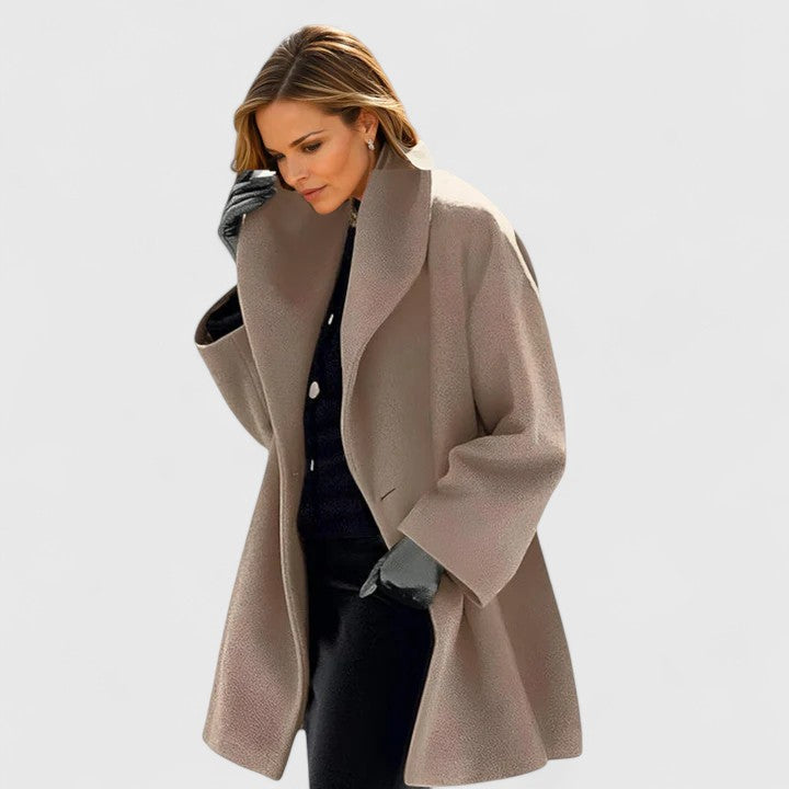 Versatile women's elegant winter coat, a seasonal essential. Warm outerwear & chic layering piece for autumn/winter.