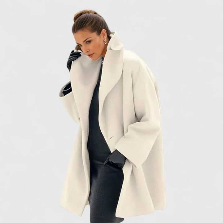 Stylish women's elegant winter coat, offering warm outerwear & a comfortable fit. Perfect for autumn fashion style.