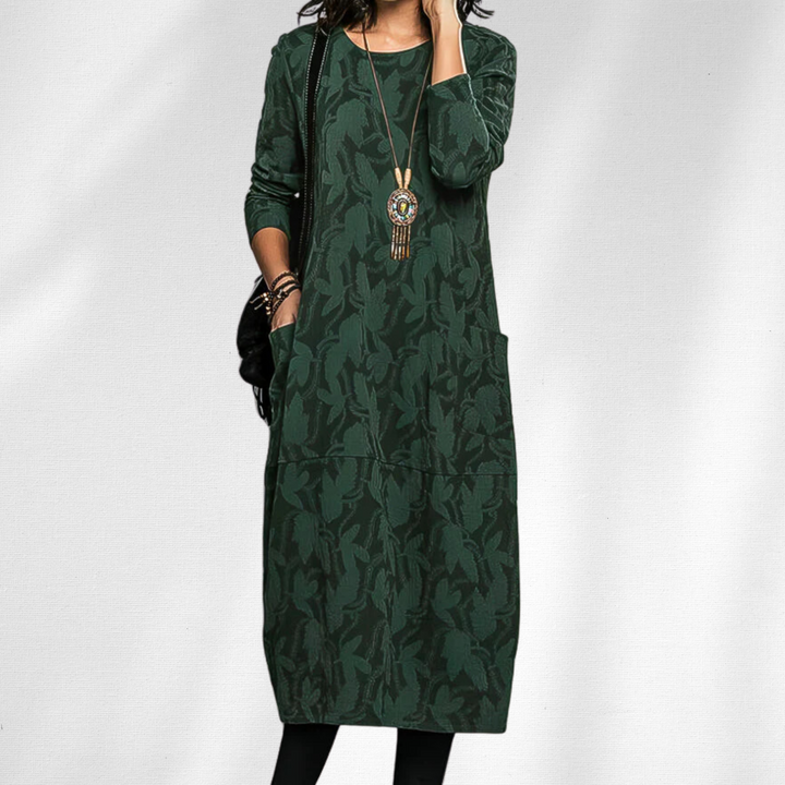 Elegant women's winter dress with cozy crewneck, long sleeves, and practical pockets, perfect for stylish autumn comfort.